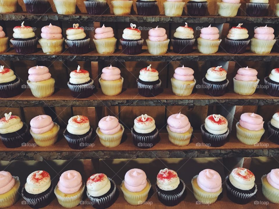 Wall of cupcakes at wedding 