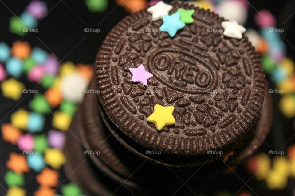 Treat tower, surrounded by a rainbow of color 