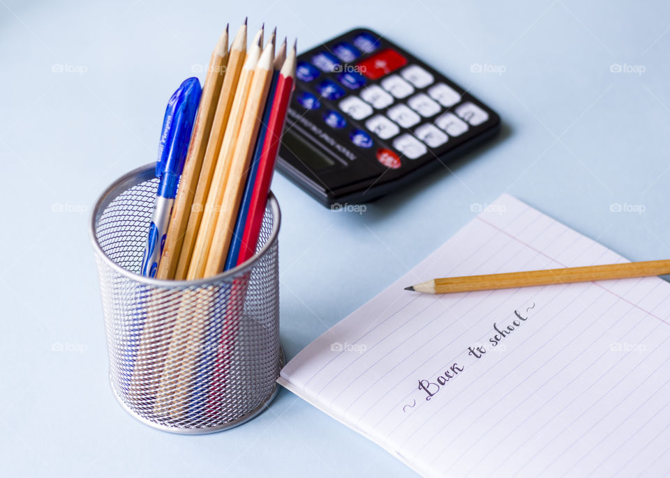back to school,  pencils and notebook on the table