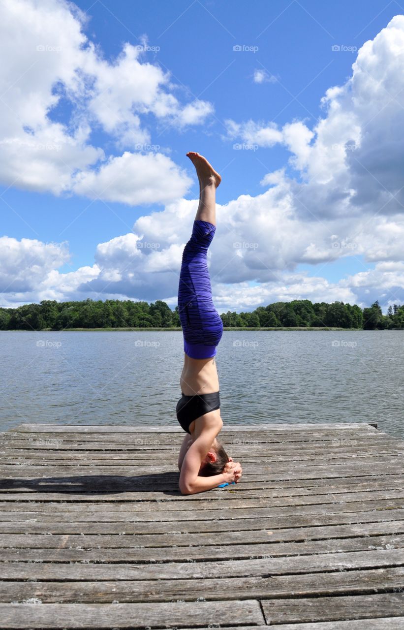 Morning yoga at the lakeside 