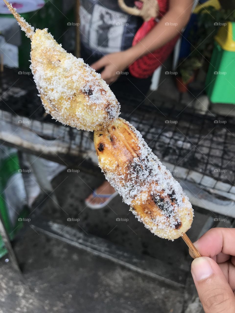 "Ginanggang" as this is locally called, made from a ripe Philippine Plantain. Skewed and cooked using coal, brushed with margarine and sprinkled with sugar. Snack!