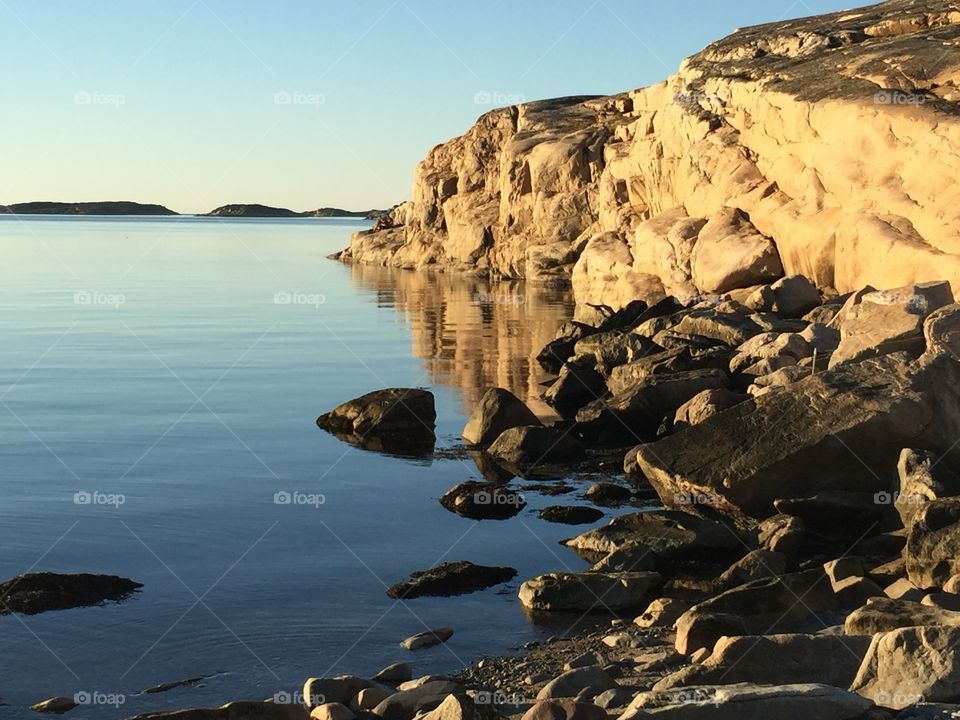 Scenics view of sea by rock