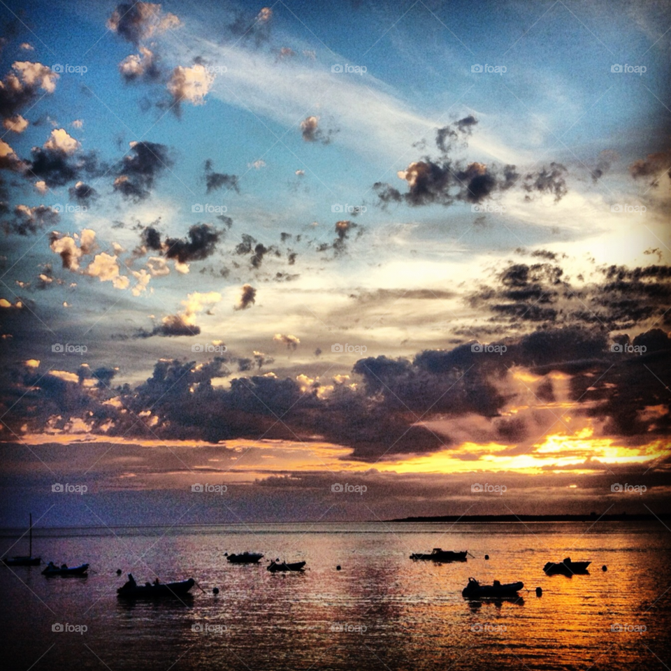 pyla-sur-mer. france sunset clouds boats by alicedebarrau