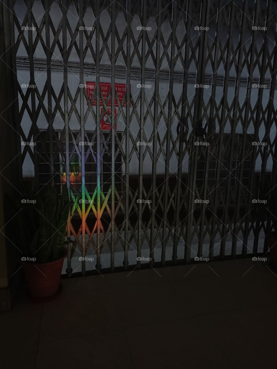 rainbow appears on the gate.