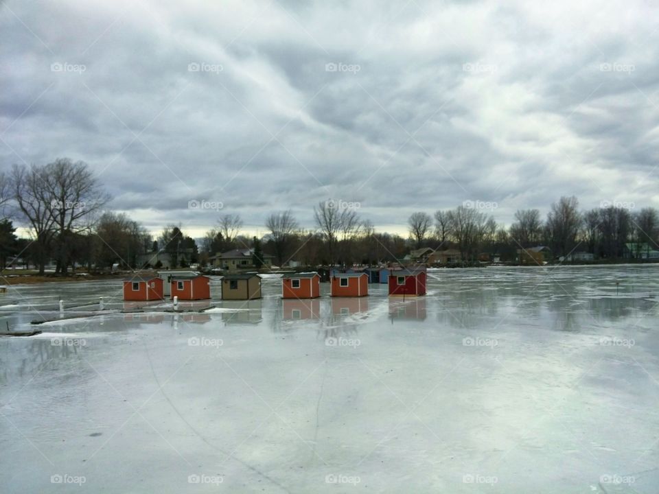 Ice huts on a frizen river in QC