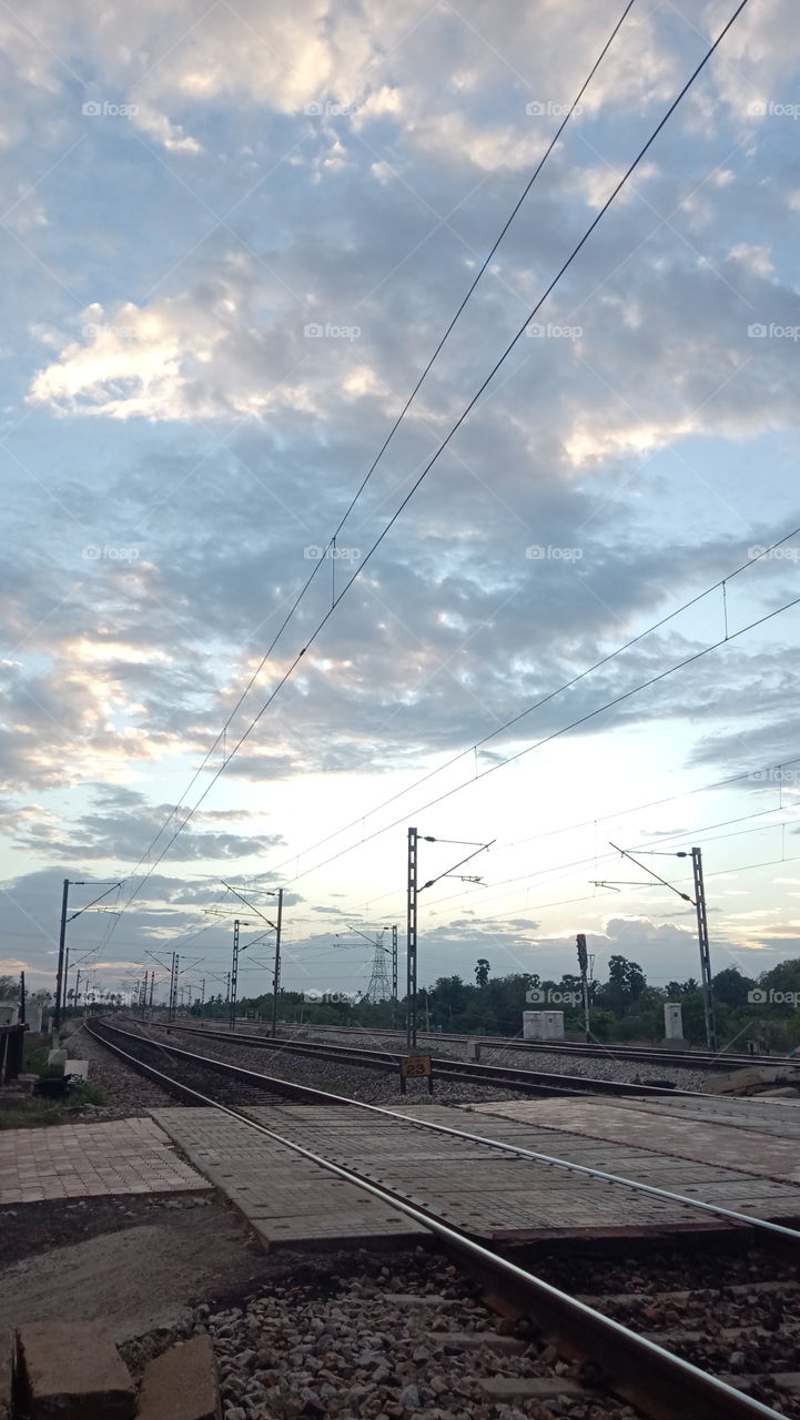 cloudy railway track,sunset,evening shown railway track,