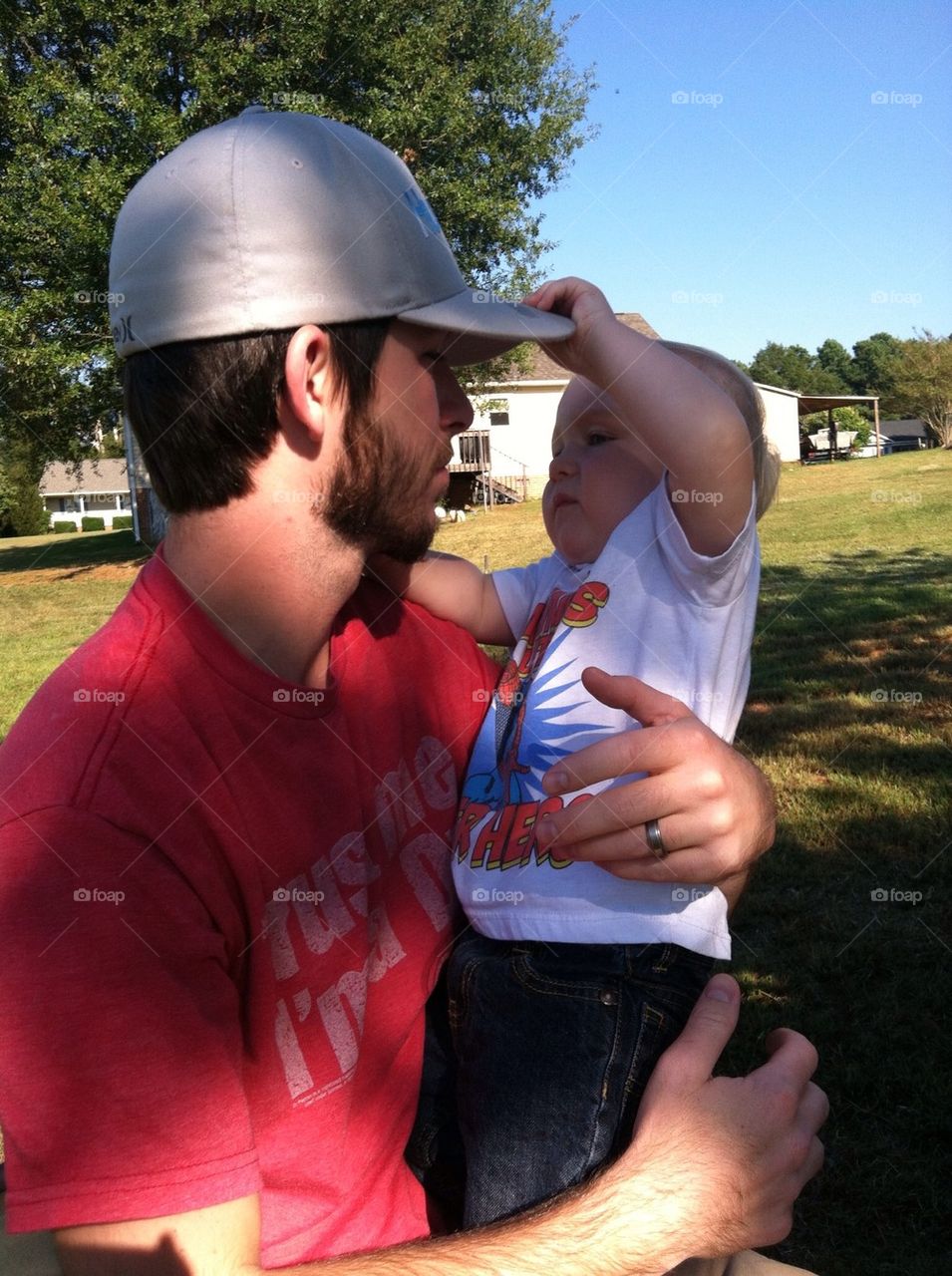 Daddy and son playing