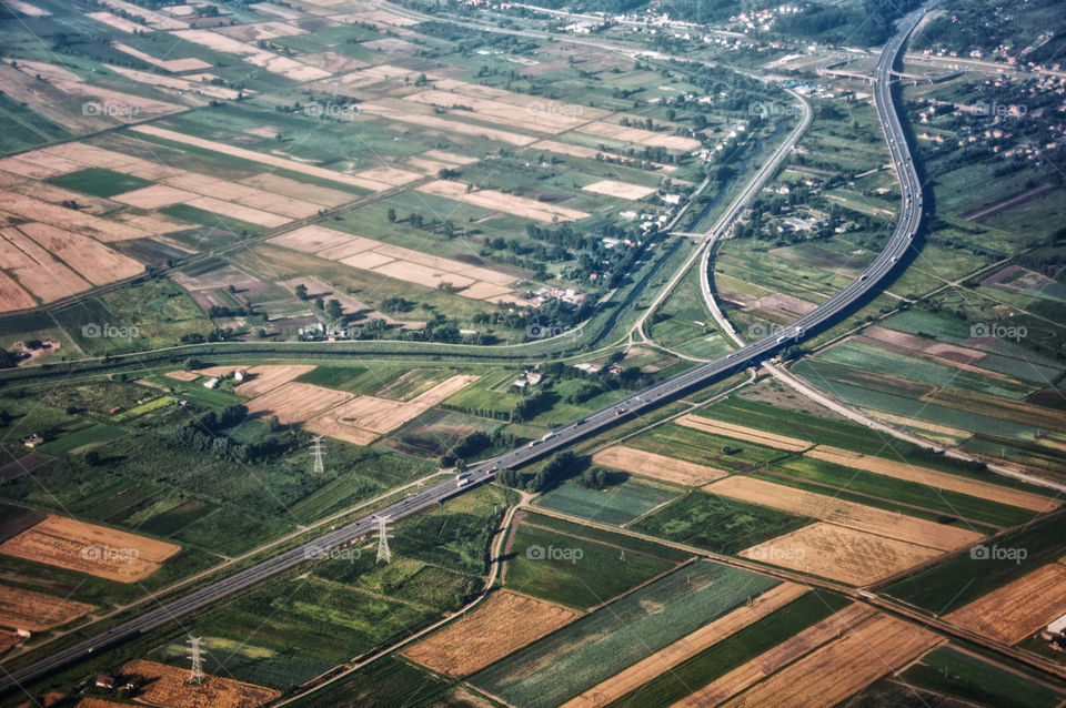 Aerial view on highway and fields in Poland