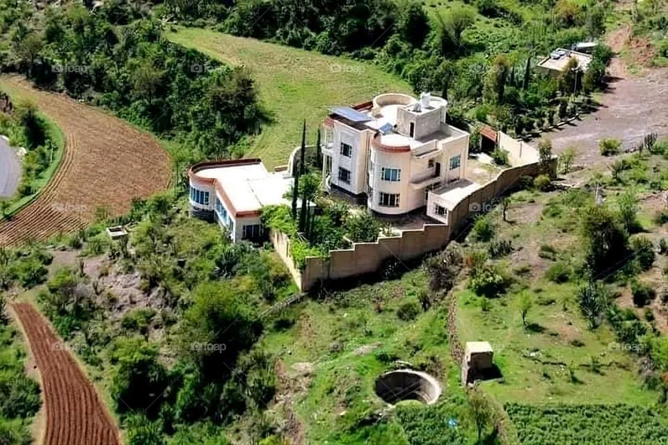 A stunning view of green mountains covered in fog in Yemen