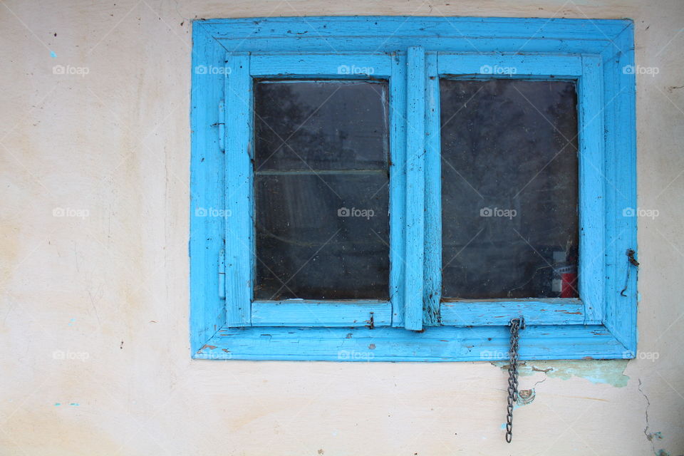 Blue old rotten wood window