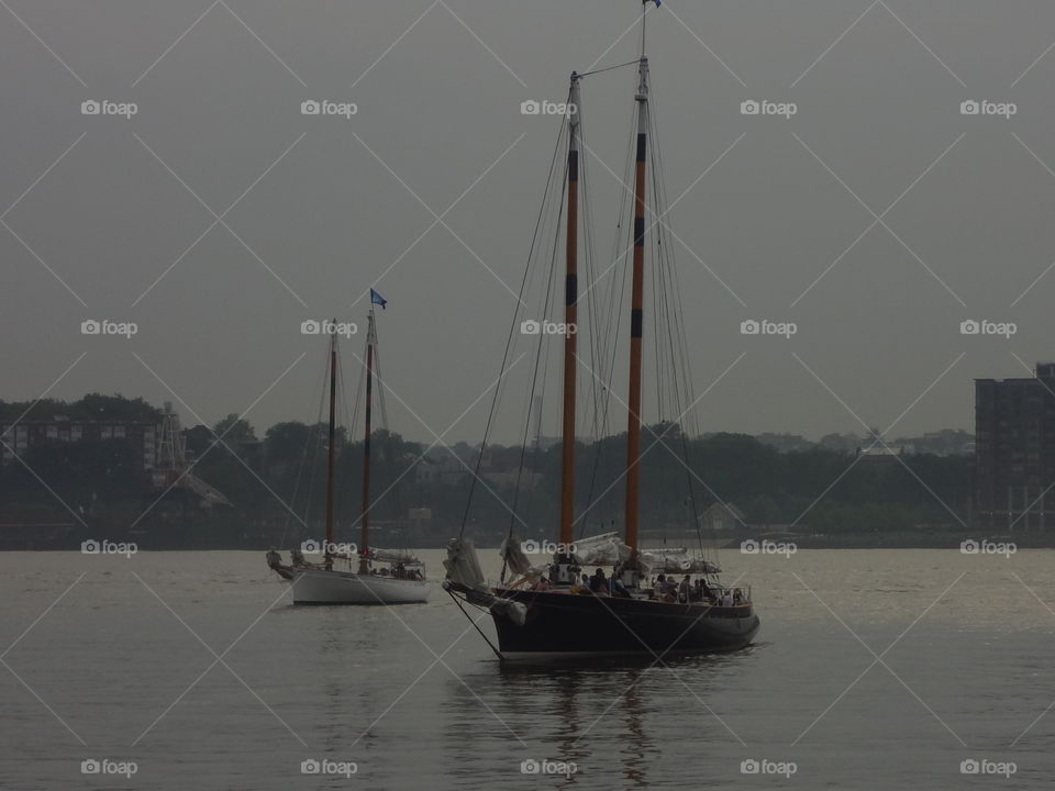 Sail Boats in New York. Seeing two sail boat coming in the dock.