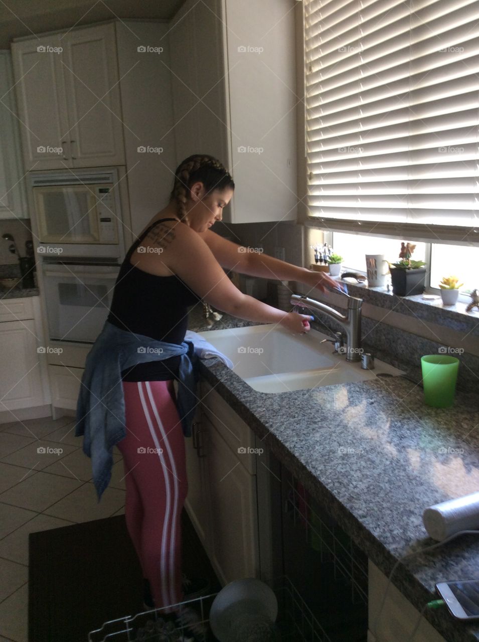 Girl doing dishes