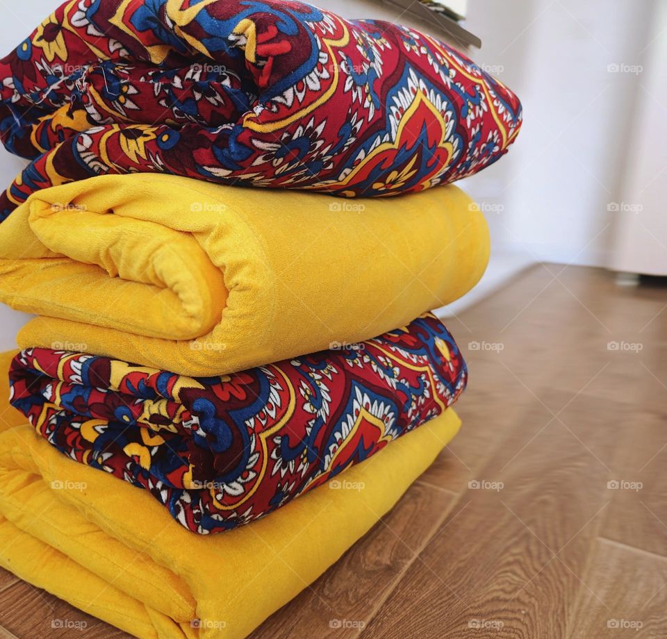 stacked colorful mattresses in Turkish style.