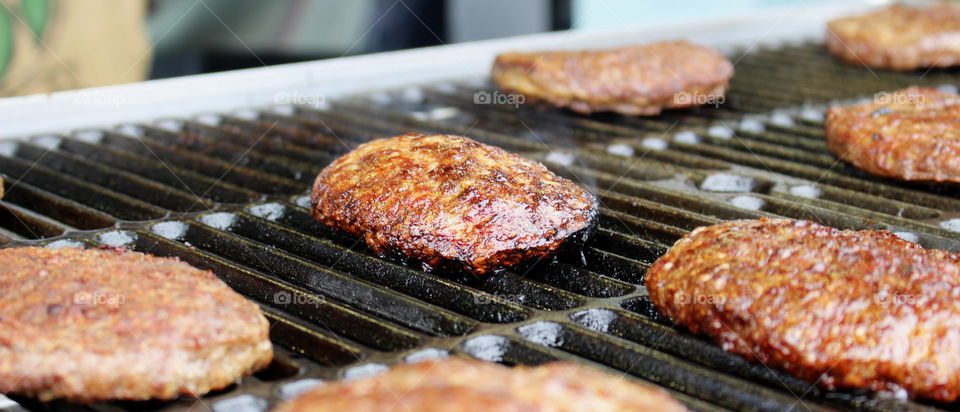 Hamburgers cooking.