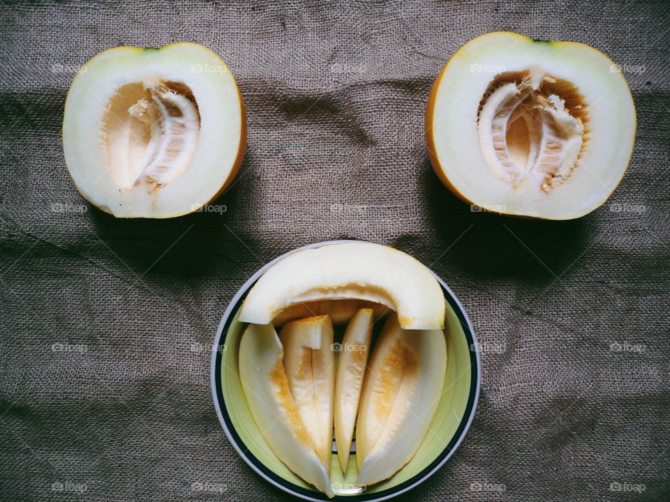 sliced ​​melon lie on the table