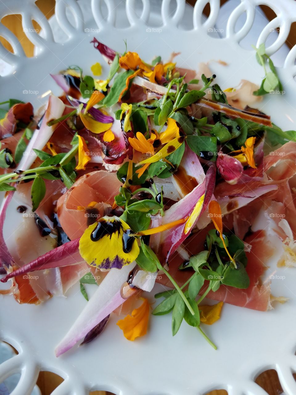 prosciutto with fresh greens & petals