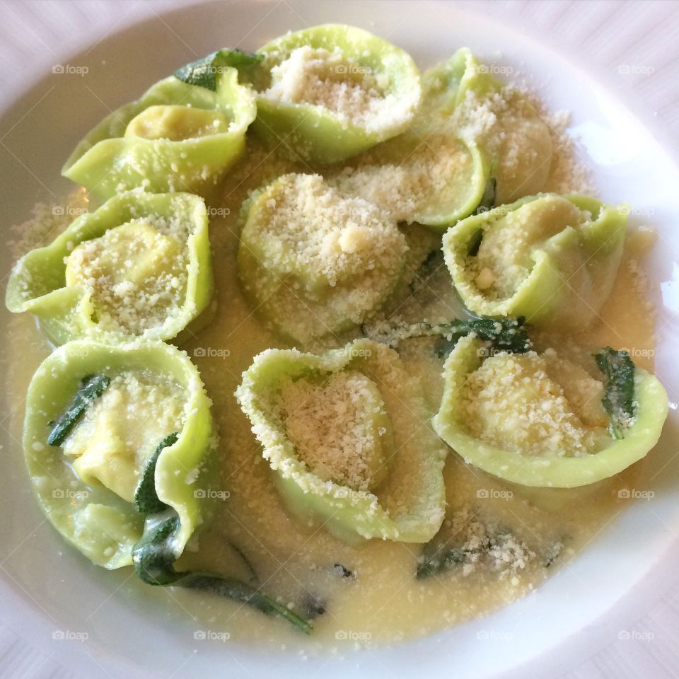 Pasta with sage . Butternut squash tortelloni with butter sage sauce