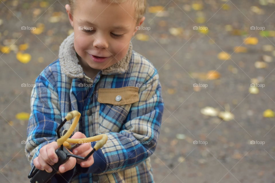 Playing with a slingshot