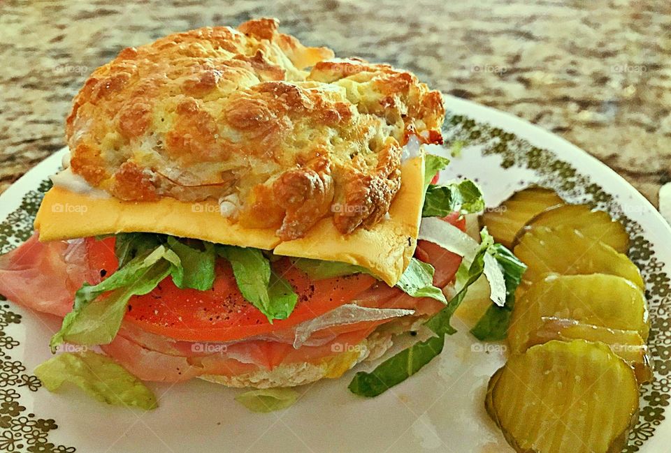 Ham & Cheese on a homemade yoghurt and flour bagel with lettuce, tomato, onions! Garnish with Bread & Butter pickles! 