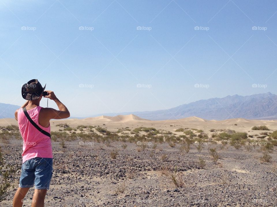 Tourist looks the desert