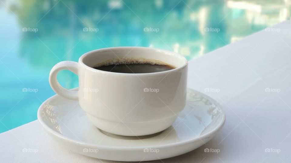 Morning ritual - having a big cup of coffee outdoors 