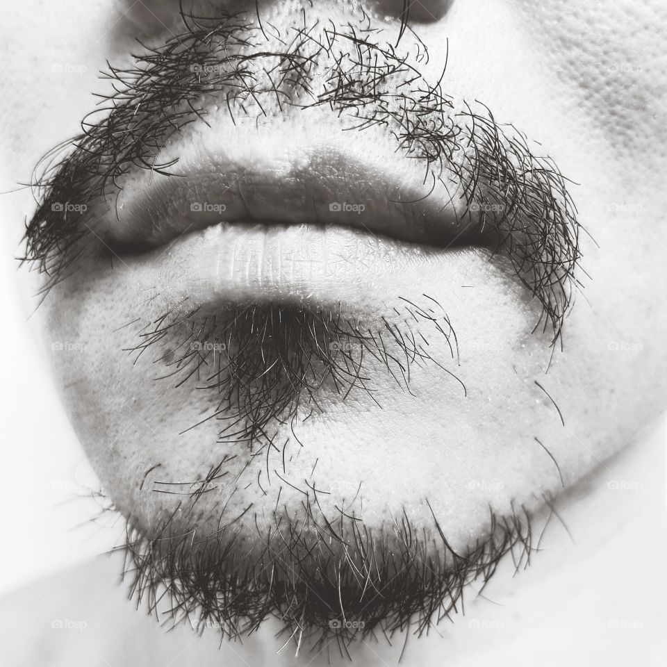 Human face with mustache and beard