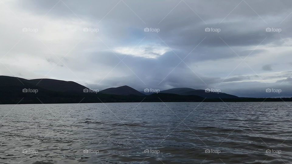 this photo shows how beautiful the mountains can be when you add a loch into the mix.