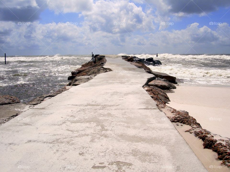 Walkway leading towards the sea