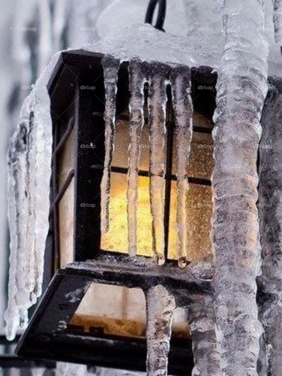 I don't cope well with the cold. I was trembling when I reached this beauty.One of the decorative lanterns on the street was frozen. Ice lanterns are one of the beautiful and amazing effects of winter nature, And they make the cold bearable for me