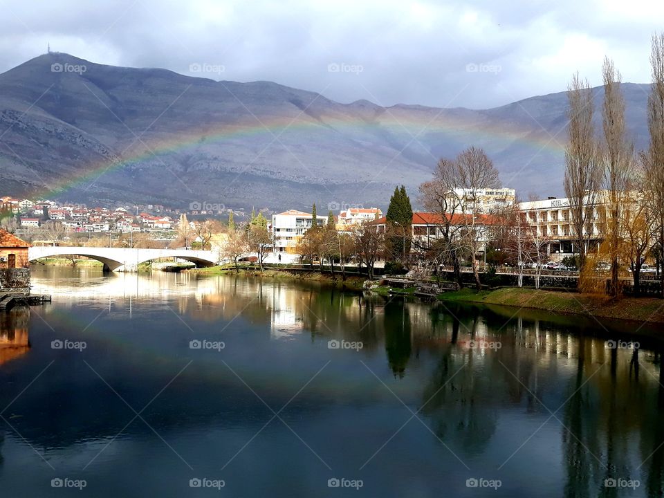 rainbow, reflection in water