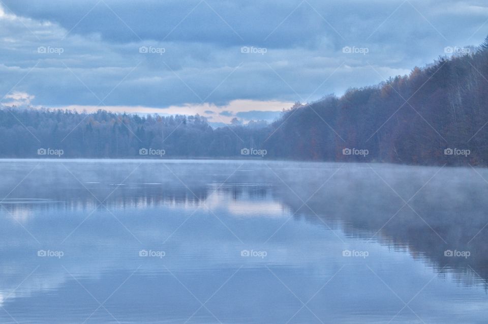 Foggy morning at the lake in poland