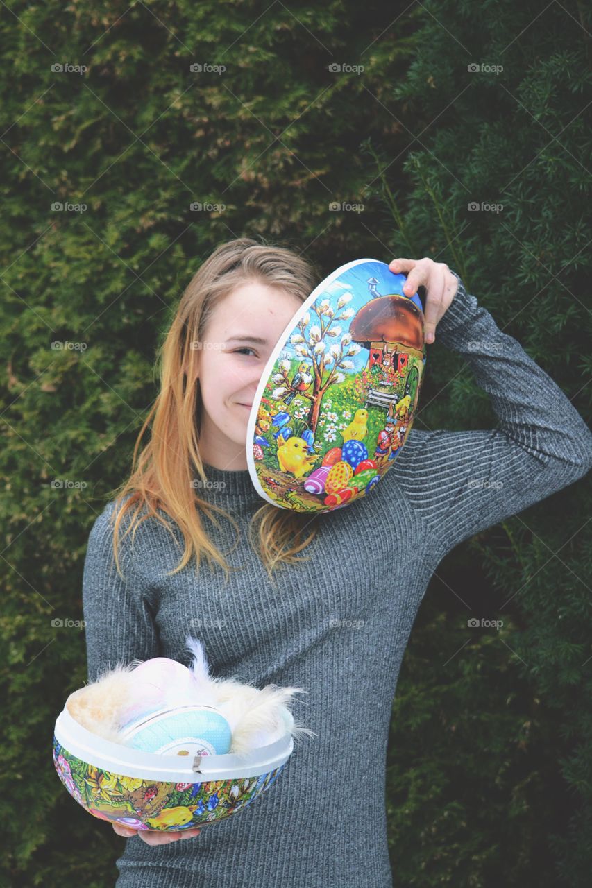 Happy girl with easter egg