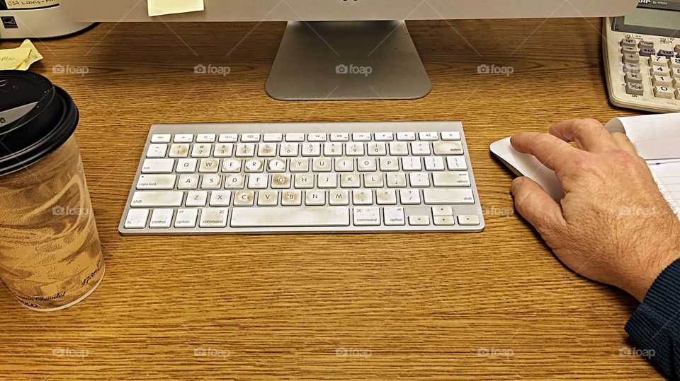 Hand Using Mouse and Keyboard