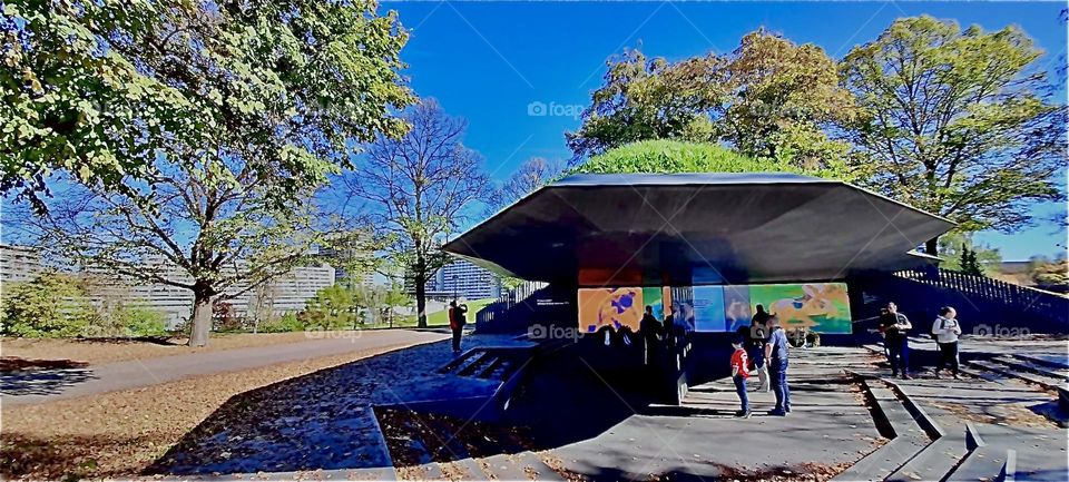 Another look at the memorial built for the victims of the assassination of „Israeli“ „Olympic team“ members during the 1972 sports events in „Munich“, Germany. The sites contains photos and a commemorative reef. 2022. Hypnotic Productions