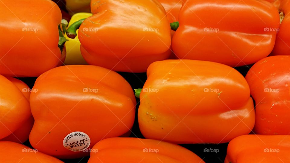 Orange Bell Peppers on display in the Market!