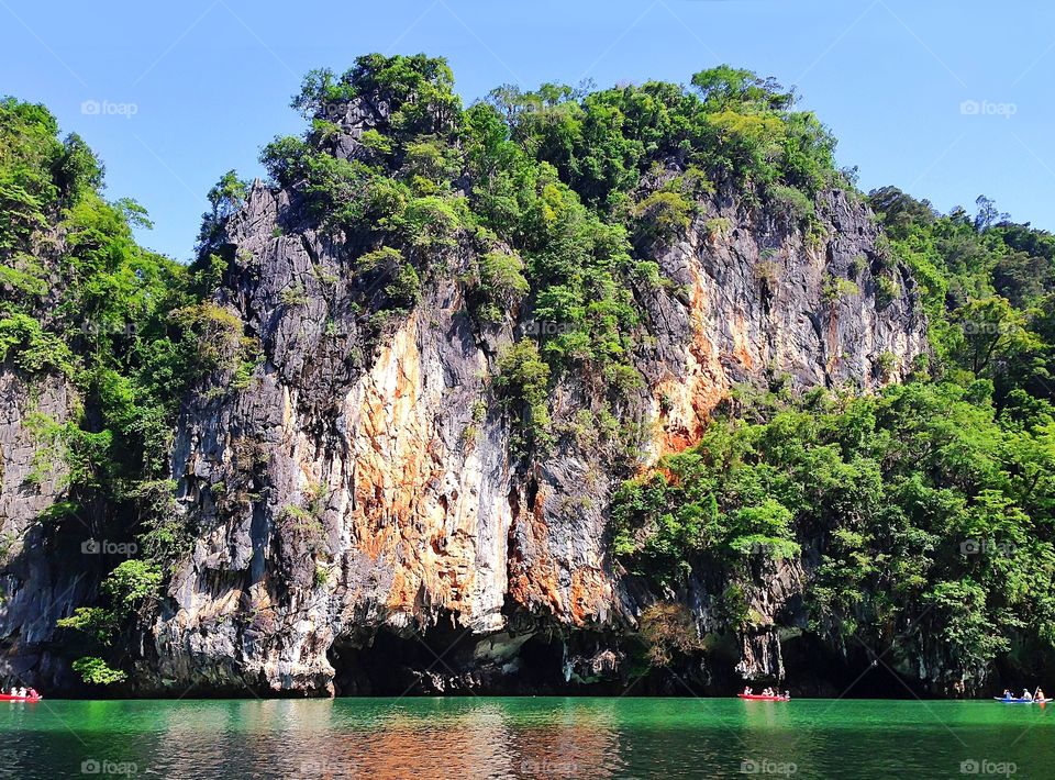 Summer tropical travel by boats in sea 