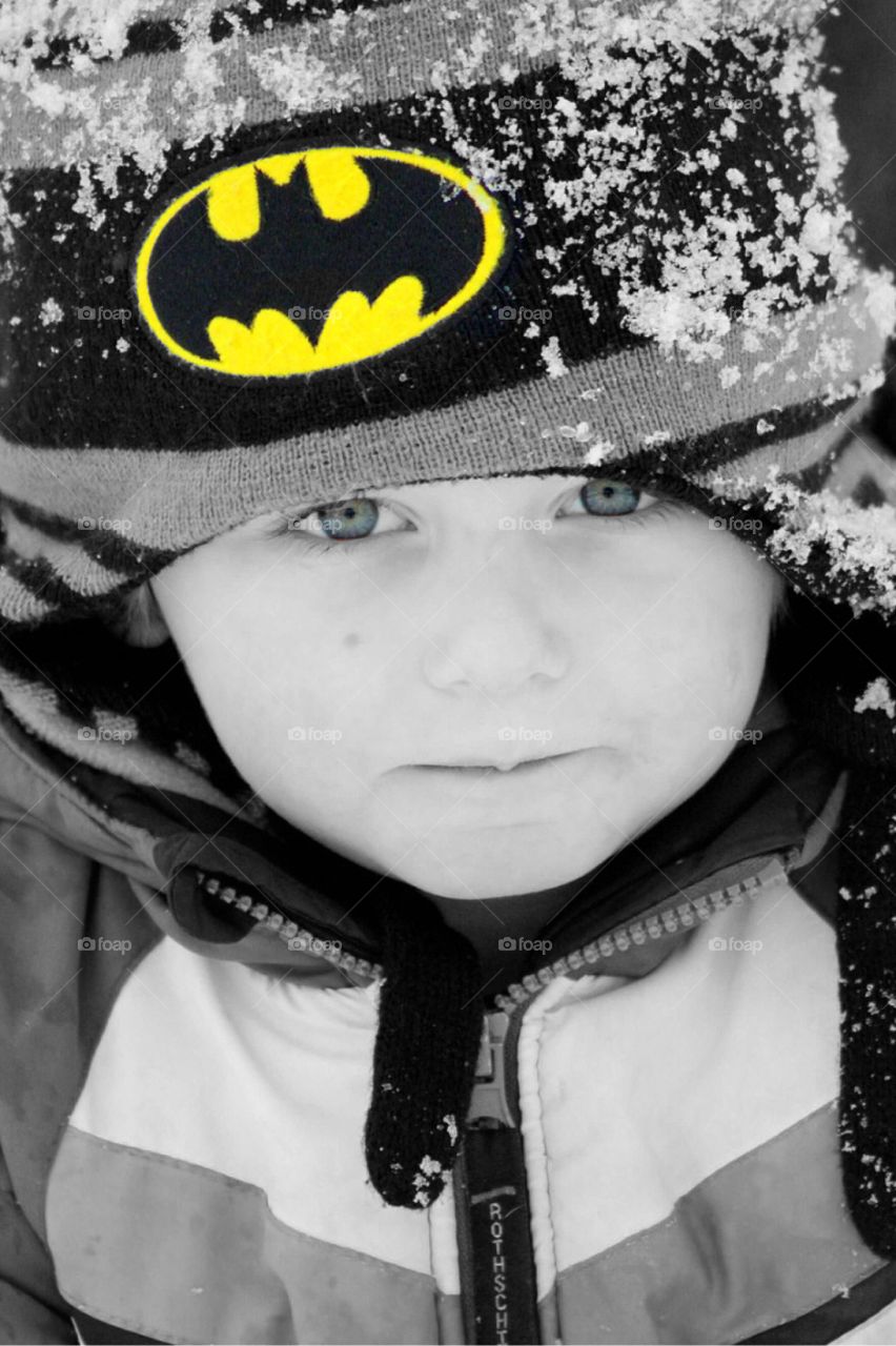 Close-up of a boy in warm clothing during winter
