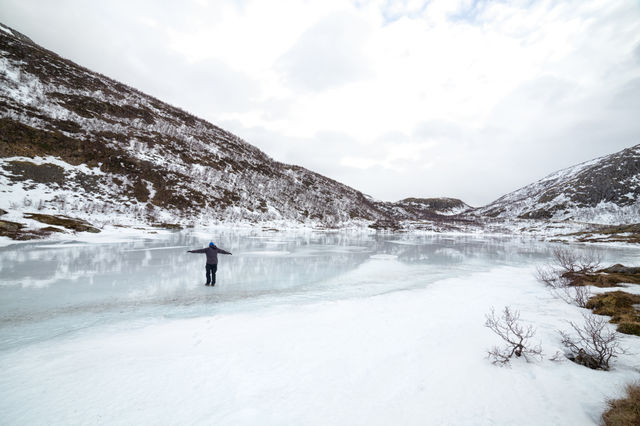 The essence of Norway. Lake frozen  near Tromso 