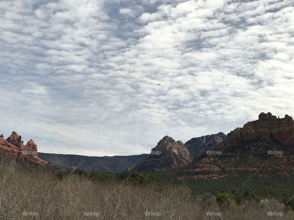 Red rock mountains on a cloudy spring day in Sedona, Arizona.