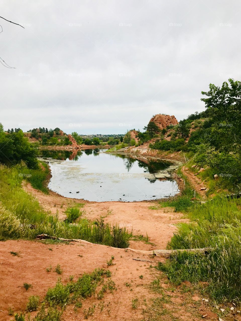 The lake at red rock open space in Colorado Springs, Colorado on an overcast summer day