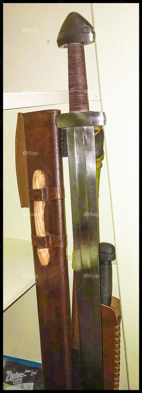A private arsenal of battle-ready Norse edged implements in a sacred closet.