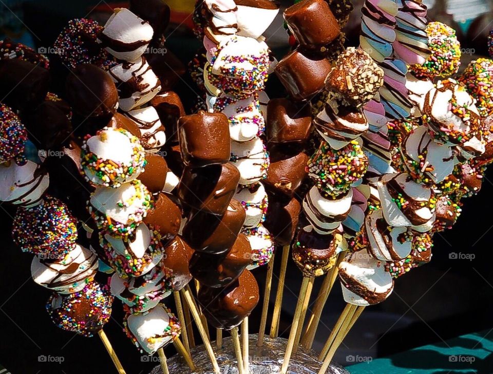 Marshmallows covered in chocolate and sprinkles at NYC street festival
