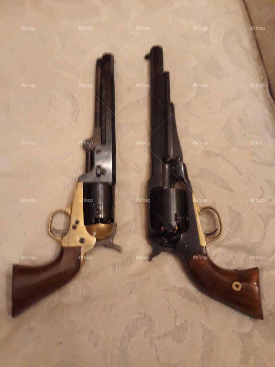 1851 Colt Navy (left) with 1858 Remington new model army (right)