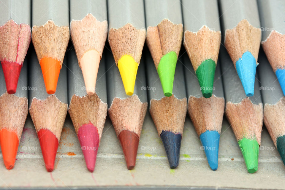 Box of sharp bright color pencils