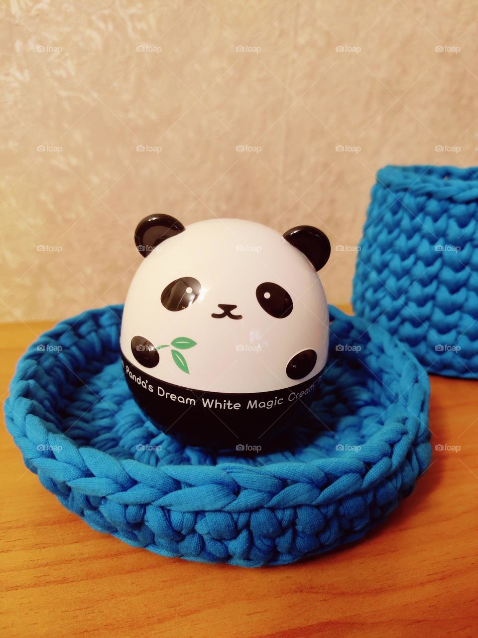 Jar in the form of a panda in a basket