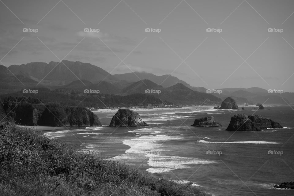 Oregon beach #oregon #monochrome #beach #adventure #waves #nature #rocks #hills #mountains #blackandwhite #travel #trip