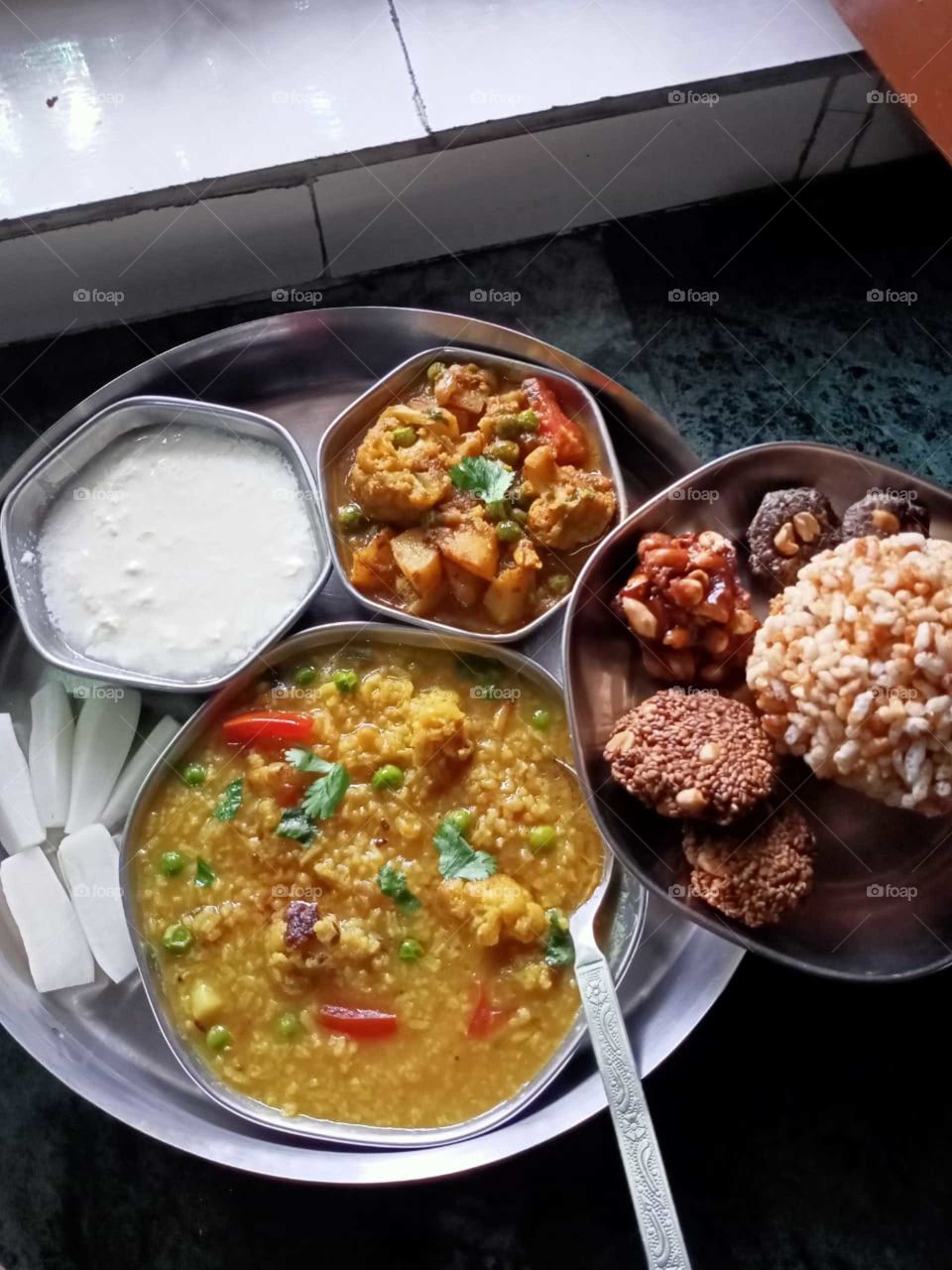 Khichdi is one of the most basic dishes made up of a combination of rice and lentils with very little spices is quintessential to the Indian diet.