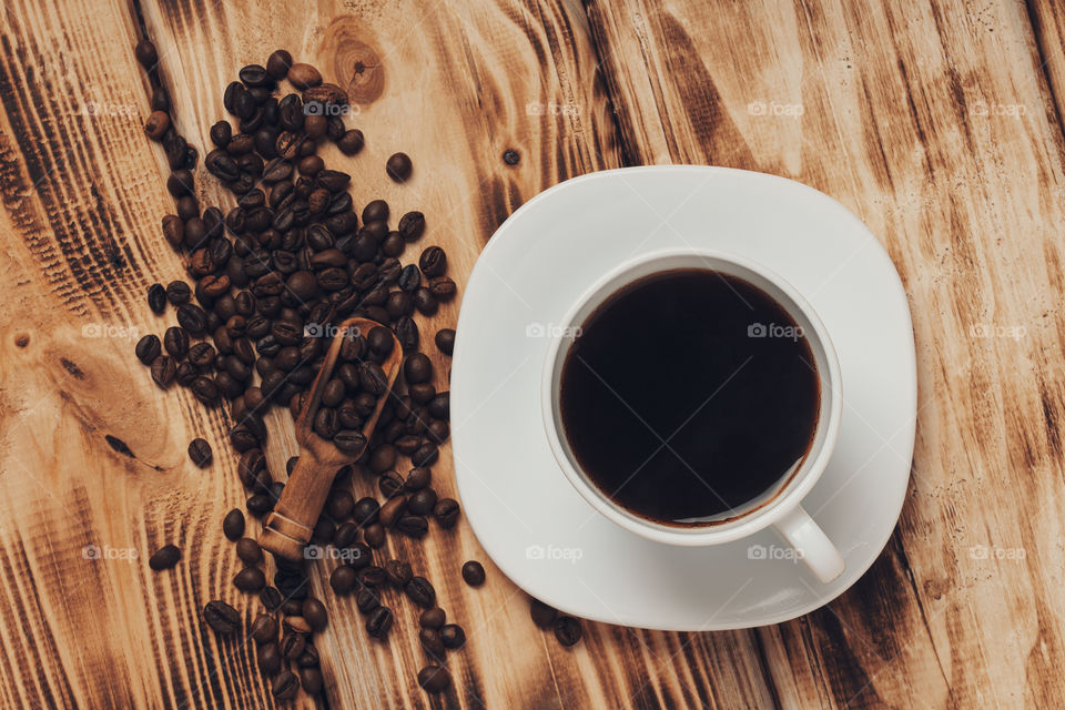 coffee cup on wooden background.  top view. flat lay