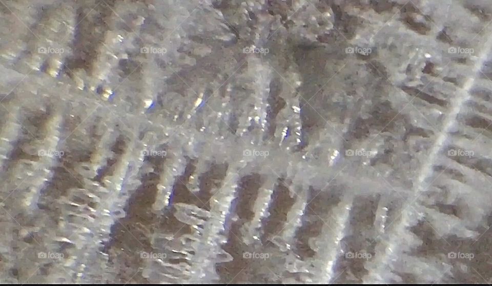 Like needles of an icicle in the wintertime does this unidentified salt appear under 1200 x magnification of a microscope camera photographed in Bushwick, Brooklyn in 2017. Hypnotic Productions