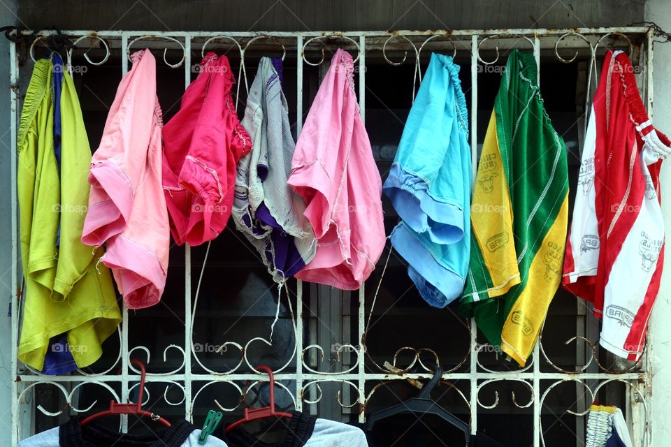 washed clothes hung to dry. washed clothes hung to dry in a clothes line